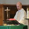 Father Kevin Maloney officiates the Basilio memorial mass at St. Agatha’s Church in Canastota