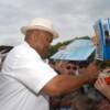 "Big" George Foreman signs autographs for the fans