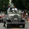 Marvelous Marvin Hagler enjoys the Parade of Champions as thousands of fans look on