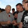Gene Fullmer signs autographs for the fans