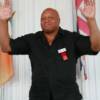 James (Bonecrusher) Smith waves to his fans