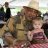 Hall of Famer Ken Norton with a young fan