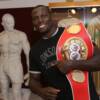 IBF cruiserweight champ Steve "USS" Cunningham poses proudly with his title belt