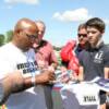 James "Buddy" McGirt signs autographs for his fans