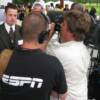 Howard Cosell's grandson, Colin Cosell, talks to ESPN camera crew
