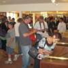 Boxing fans enjoy the Hall of Fame Museum's many exhibits on boxing history.