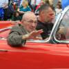 Canastota' s Carmen Basilio waves to fans and friends during the Parade of Champions.