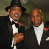 Heavyweight champions Ken Norton and Mike Tyson meet at the Banquet of Champions.