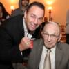 South Africa's Brian Mitchell puts up a fist with Canastota's Carmen Basilio.