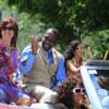 The Hearns family waves during the Parade of Champions