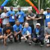 Boxers Hill, Jackson, McKenzie, Hagler, Jackson, McCrory, Starling, Manfredy, Patterson and Ward gather for a photo before the start of the 5K Race