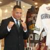 Virgil Hill poses by his robe and the robe of fellow inductee Arturo Gatti