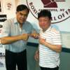 Hall of Famer Pipino Cuevas shows new inductee Myung-Woo Yuh his Hall of Fame ring