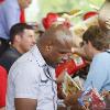 Glen Johnson signs autographs for his fans.