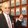 Marc Ratner points to his plaque on the Hall of Fame Wall.
