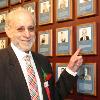 Marc Ratner points to his plaque on the Hall of Fame Wall.