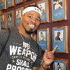 Shawn Porter points to Marvelous Marvin Hagler's plaque on the Hall of Fame Wall.