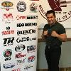 Marco Antonio Barrera in fighting pose by 2017 Hall of Fame sponsor banner.