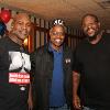 Evander Holyfield, referee Kenny Bayless and Riddick Bowe.