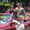 Canastota's welterweight champ Billy Backus enjoys the parade with his family.
