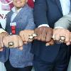 Hall of Fame hardware - Class of 2017 show off their new gold rings.