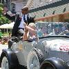 Marvelous Marvin Hagler waves to fans who filled the streets of downtown Canastota.