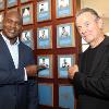 Evander Holyfield and Eric Braeden by "The Real Deal's" Hall of Fame plaque.