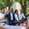 The Holyfields enjoy a trip through the streets of "Boxing's Hometown" during the Parade of Champions just prior to the Official Induction Ceremony.