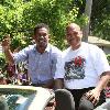 Parade route puts a smile on the faces of Daniel Jacobs and his trainer Andre Rozier.