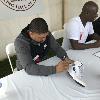 2018 Hall of Famer Winky Wright and Antonio Tarver sign autographs for fans on the Hall of Fame Grounds.