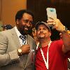 Thomas "Hitman" Hearns takes a selfie with a fan at Turning Stone Resort Casino.
