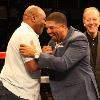 "Iron" Mike Tyson and Winky Wright embrace center ring at Turning Stone Resort Casino