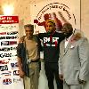 Julian "The Hawk" Jackson, "Swift" Jarrett Hurd and James "Lights Out" Toney pose by the Hall of Fame logo.