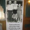 Photo of Basilio and his parents on display at reception