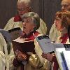 The St. Agatha’s Church Choir sing hymns during the Basilio memorial mass