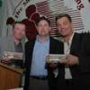 Canastota mayor Todd Rouse (center) presents Ward and Gatti with a key to the village.