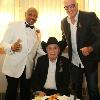 Marvelous Marvin Hagler (left) and Gerry Cooney(right) pose for a photo with LaMotta (center).