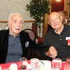 Hall of Fame legends LaMotta and Angelo Dundee visiting during a luncheon in Canastota. 