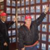 Torres proudly points to his plaque on the Hall of Fame Wall with fellow Hall of Famer Carlos Ortiz