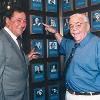 Hall of Famers Bob Arum and Lou Duva by their plaques on the Hall of Fame Wall