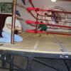 Hall of Fame volunteers tighten the famous red velvet ring ropes