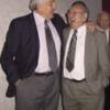 Hall of Famers Schayes and Basilio share a laugh