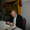 Carmen Basilio signs copies of his new book