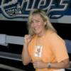 Martin strikes a fighting pose by the Syracuse Chiefs logo