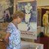 Lathan takes in the exhibit of undefeated heavyweight champion Rocky Marciano.