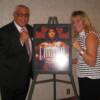 Jimmy Burchfield and Christy Martin pose by her famous Sports Illustrated cover