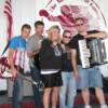 Martin poses with members of Fritz's Polka Band who entertained community residents with the sounds of polka. 