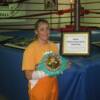 Martin poses with her championship belt in front of the MSG ring. Martin fought in the famous ring twice during her career.
