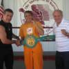 Vito Antuofermo (left) and Carlos Ortiz (right) celebrate Martin's WBC title win.