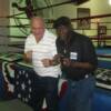 Ortiz and Griffith in a fighting pose next to the most famous ring in the world. 